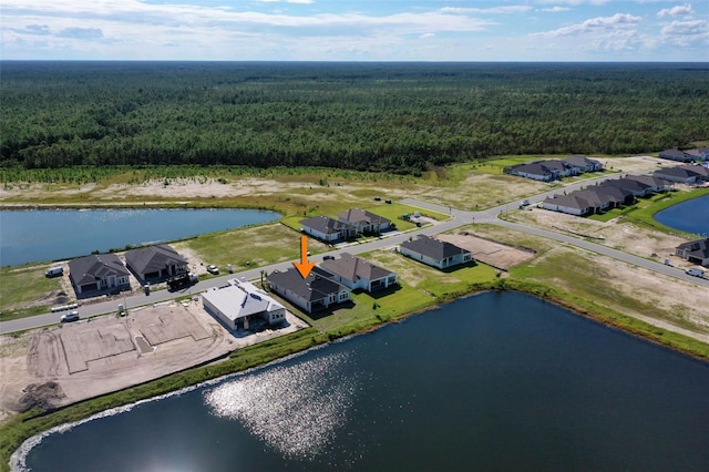 drone / aerial view featuring a water view