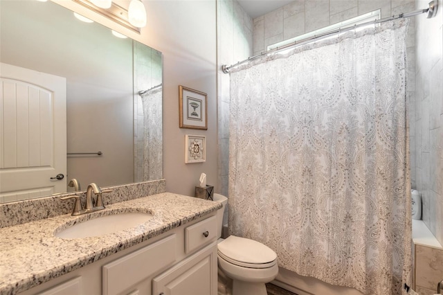 full bathroom with vanity, toilet, and shower / bath combo with shower curtain