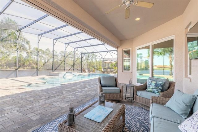 view of patio / terrace featuring glass enclosure and an outdoor hangout area