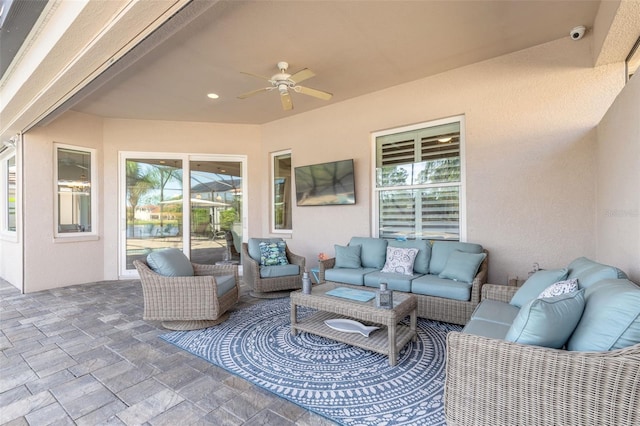 view of patio / terrace featuring outdoor lounge area and ceiling fan