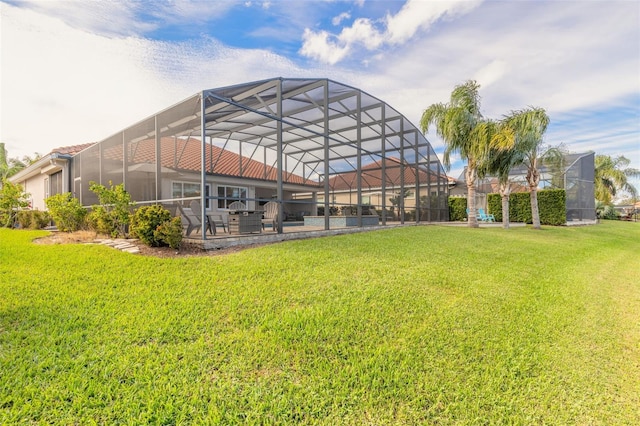 view of yard with a patio and a lanai