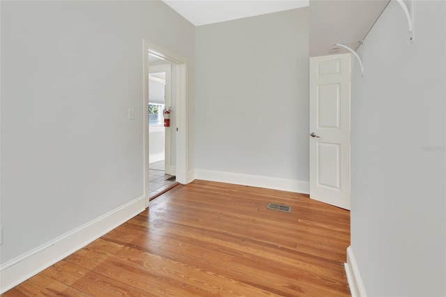 unfurnished room with light hardwood / wood-style flooring