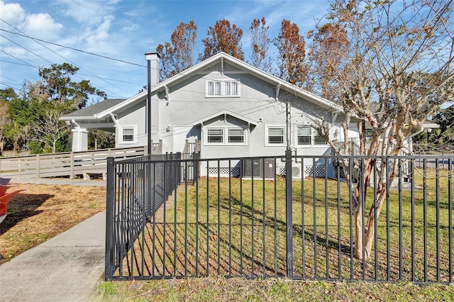 view of front of property with a front lawn