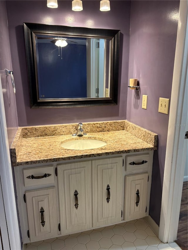 bathroom featuring tile patterned floors and vanity