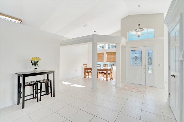 tiled entrance foyer with vaulted ceiling