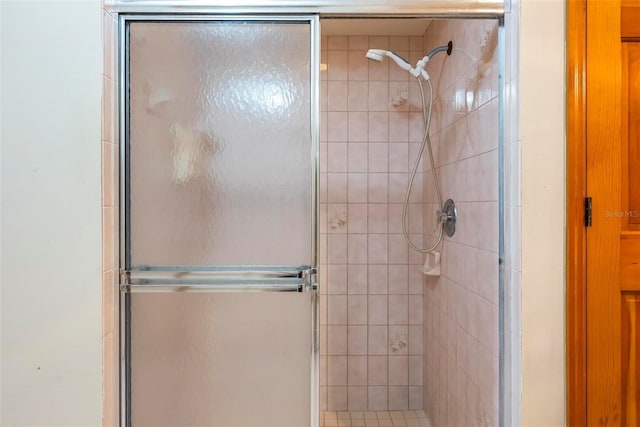 bathroom featuring walk in shower