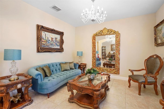 tiled living room featuring a notable chandelier