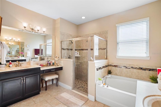 bathroom with separate shower and tub, tile patterned floors, and vanity