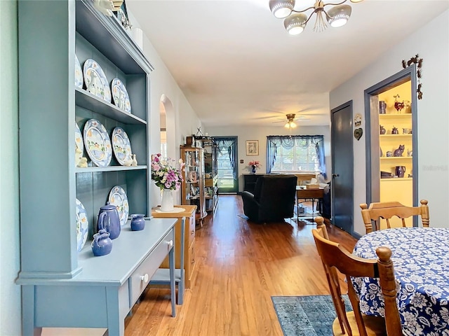 dining space featuring hardwood / wood-style floors and ceiling fan