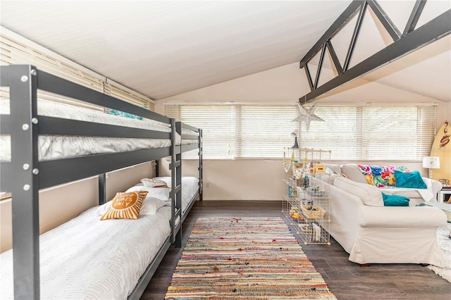 bedroom featuring vaulted ceiling with beams and dark wood-type flooring