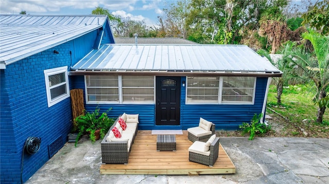 exterior space featuring an outdoor hangout area