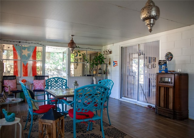 dining area with wood-type flooring