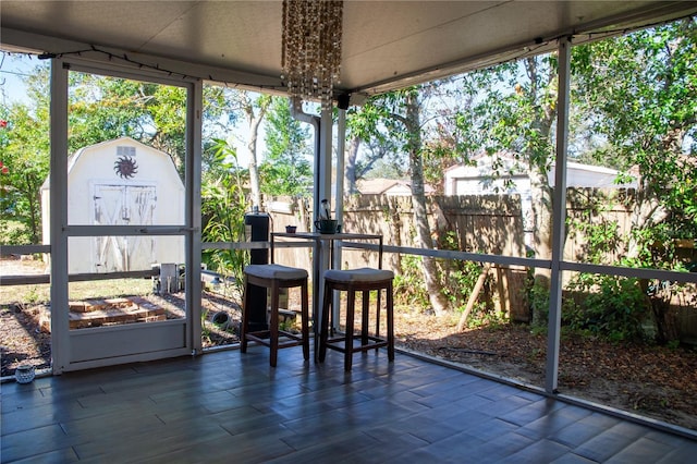 sunroom / solarium featuring a wealth of natural light