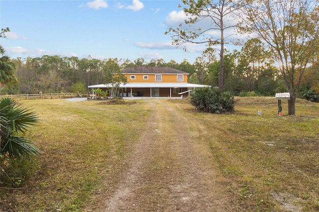 view of front of home featuring a carport