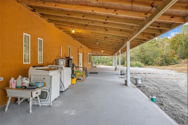 view of patio with washing machine and dryer