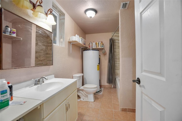 full bathroom with gas water heater, tile patterned flooring, a textured ceiling, shower / bath combo with shower curtain, and vanity