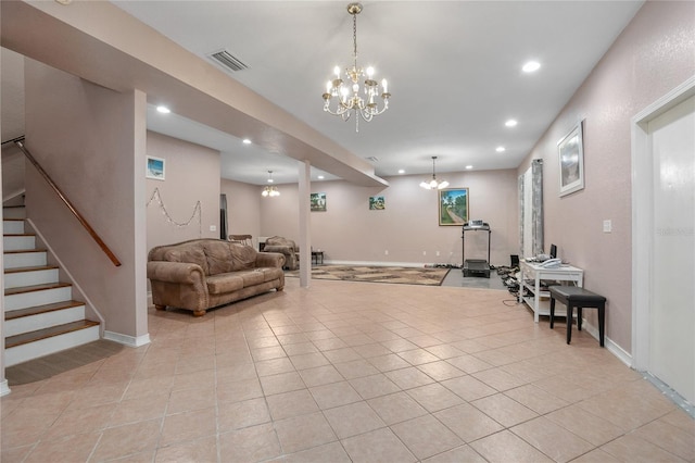 exercise room with light tile patterned floors and a notable chandelier