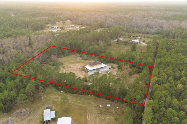 birds eye view of property featuring a rural view