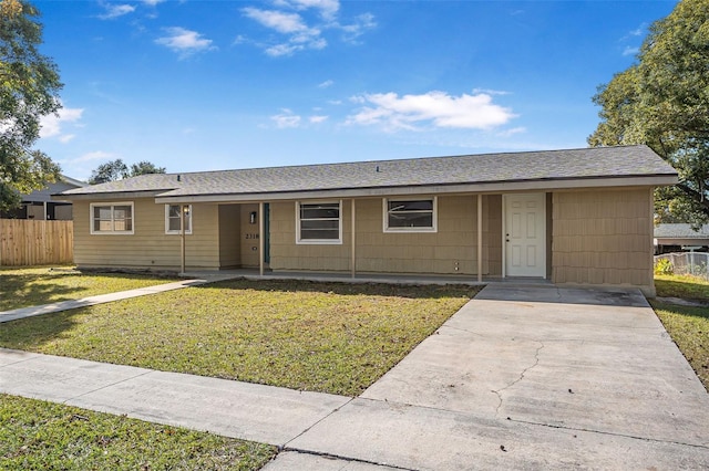 single story home featuring a front yard