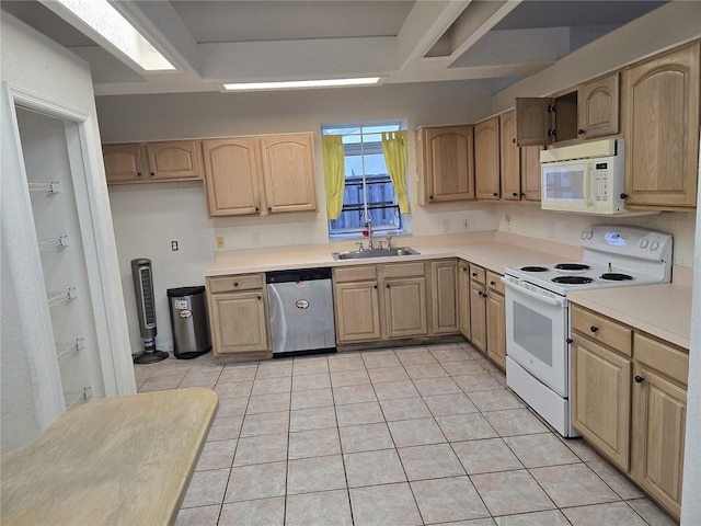 kitchen featuring light brown cabinetry, sink, light tile patterned flooring, and white appliances