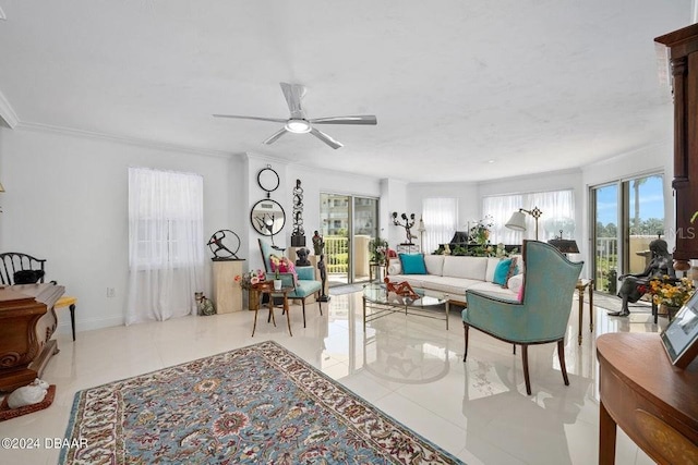 living room featuring ceiling fan, light tile patterned floors, and ornamental molding