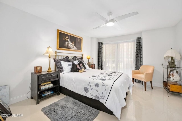 bedroom featuring light tile patterned floors and ceiling fan