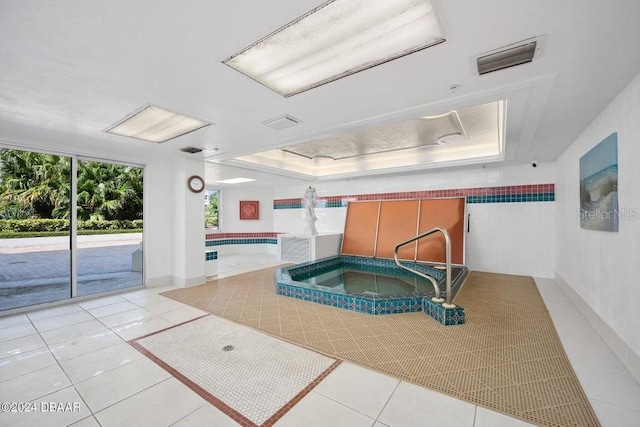 view of pool with an indoor in ground hot tub