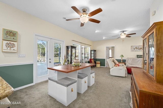 interior space featuring ceiling fan and french doors