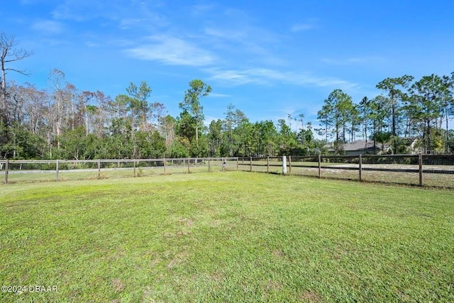 view of yard featuring a rural view