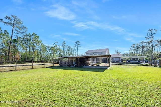 back of house with a yard