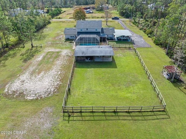 birds eye view of property featuring a rural view