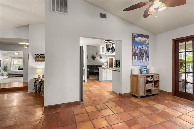 interior space featuring light hardwood / wood-style flooring and vaulted ceiling