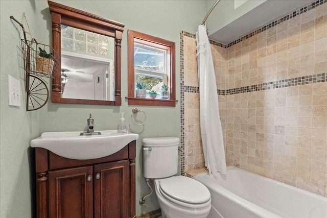 full bathroom with vanity, toilet, and shower / bathtub combination with curtain