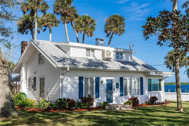 view of front of property with a front lawn