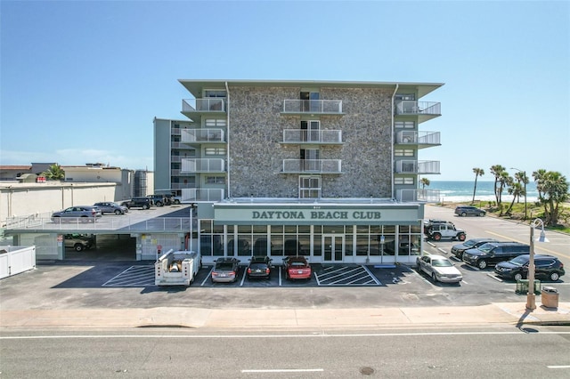 view of building exterior with a water view