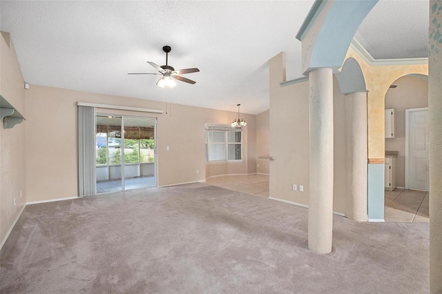 unfurnished living room with a textured ceiling, light carpet, vaulted ceiling, and ceiling fan with notable chandelier