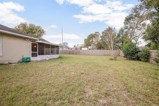 view of yard featuring a sunroom