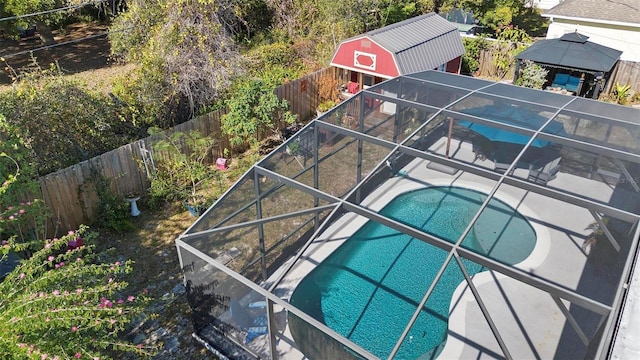 view of swimming pool featuring a gazebo and a lanai