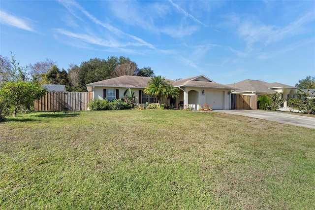 ranch-style home with a front yard and a garage