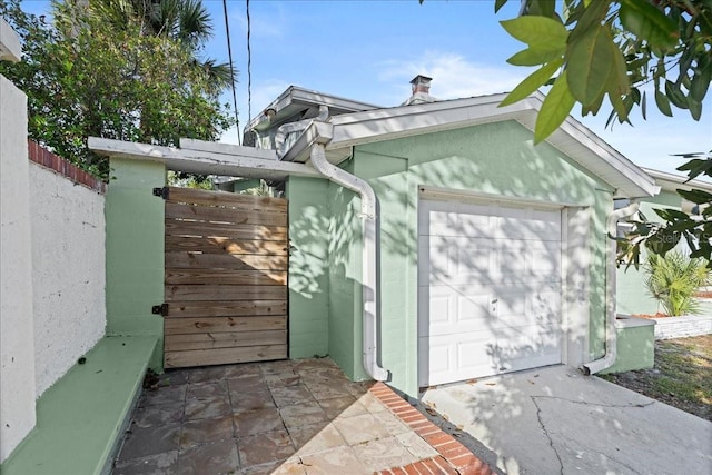 exterior space with a garage