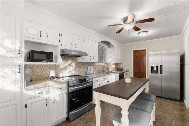 kitchen with black appliances, sink, a textured ceiling, tasteful backsplash, and white cabinetry