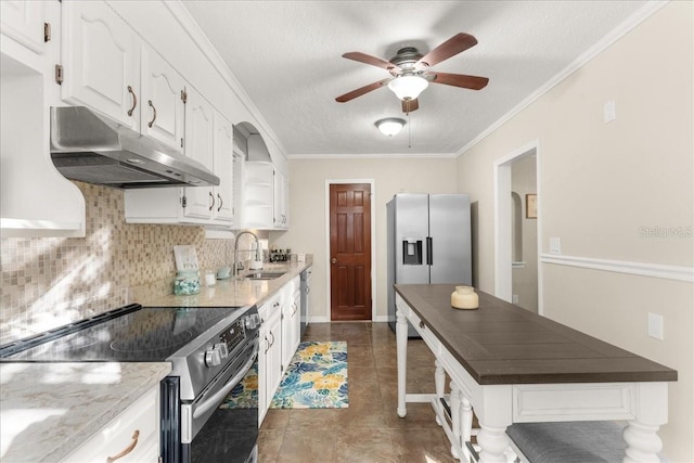 kitchen featuring crown molding, a textured ceiling, tasteful backsplash, white cabinetry, and stainless steel appliances