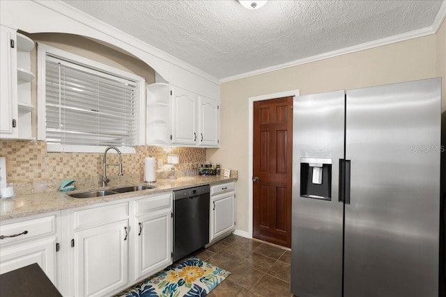 kitchen with tasteful backsplash, white cabinetry, sink, and stainless steel appliances