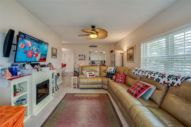 living room with ceiling fan