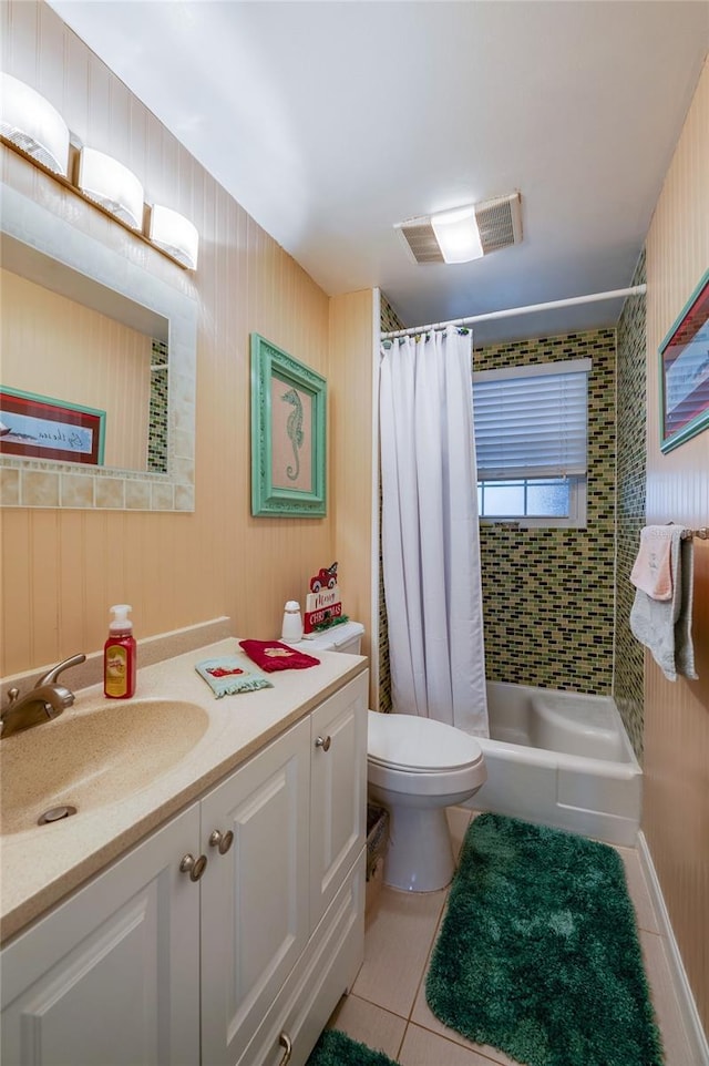 full bathroom featuring toilet, tile patterned flooring, shower / tub combo, and vanity