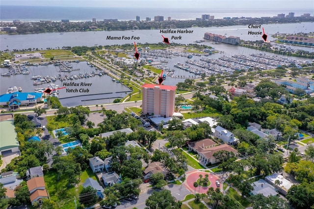 birds eye view of property featuring a water view