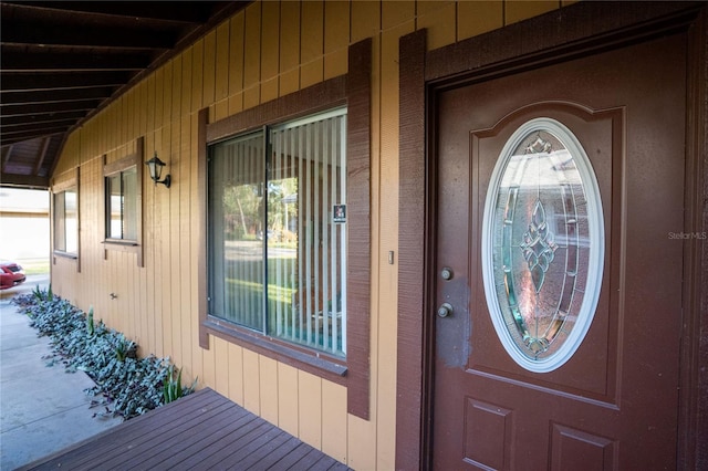 doorway to property with a porch