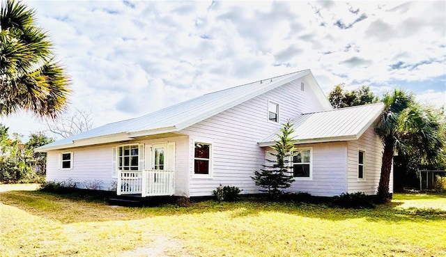 exterior space with a lawn