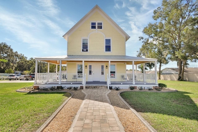 view of front facade featuring a porch and a front lawn