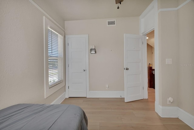 bedroom featuring light hardwood / wood-style flooring